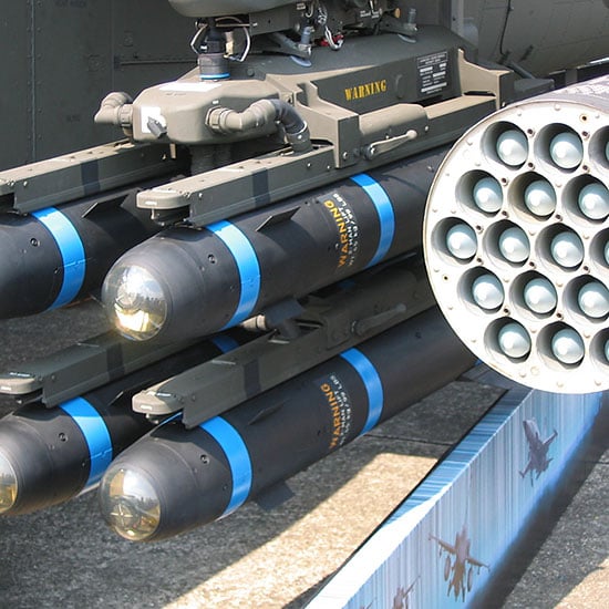 energy-attenuating material, like pumice, is used as a component in the storage and transporation of munitions of all types